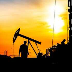 Oil Pump and Worker in Permian Basin